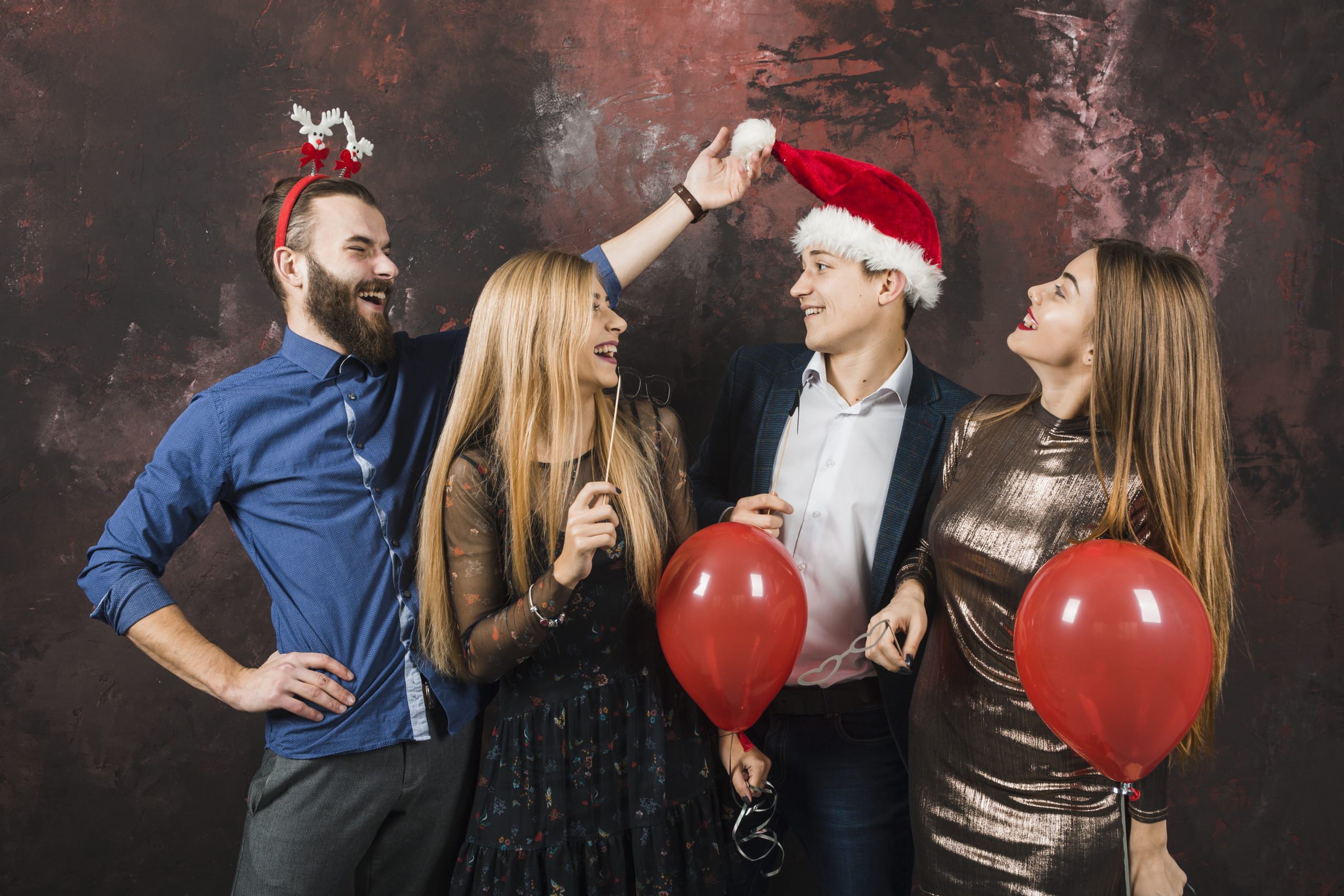 new-year-party-concept-with-four-happy-friends